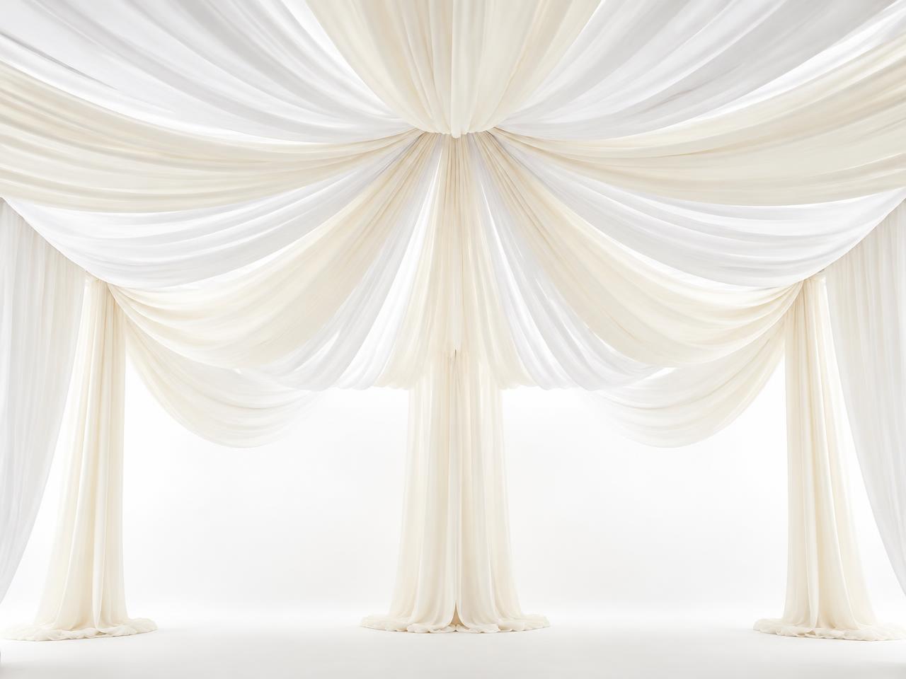 Ivory and white ceiling fabric draping swags radiating from a center point on a clean white studio background